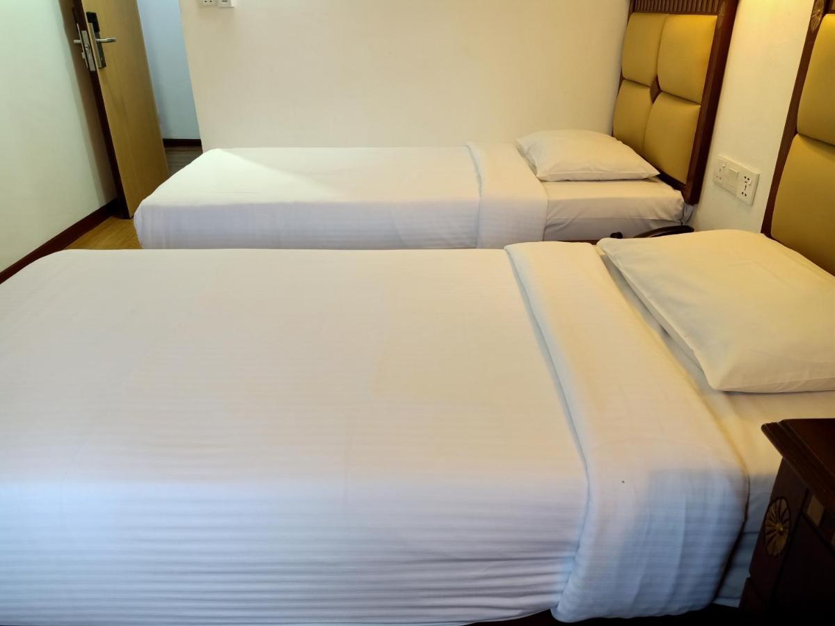 Super Oyo 90464 Borneo Suites Hotel Kota Kinabalu Exterior foto