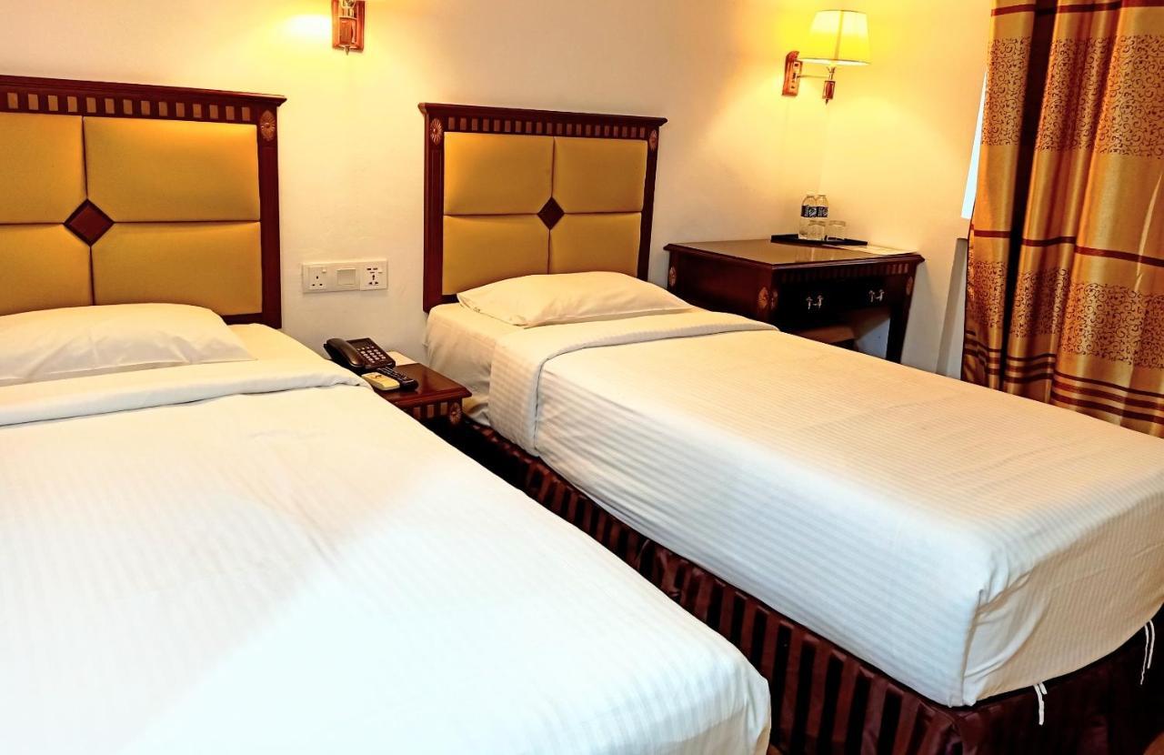 Super Oyo 90464 Borneo Suites Hotel Kota Kinabalu Exterior foto