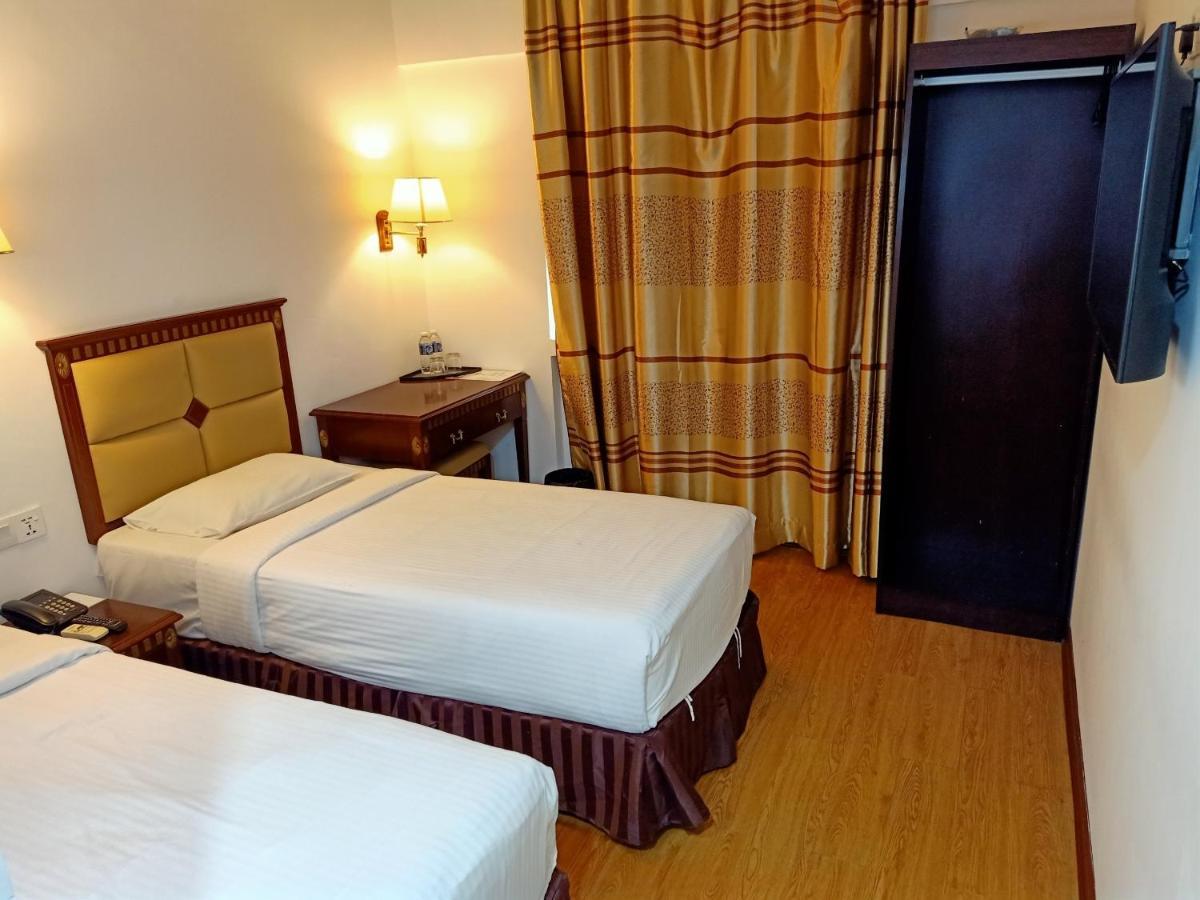 Super Oyo 90464 Borneo Suites Hotel Kota Kinabalu Exterior foto