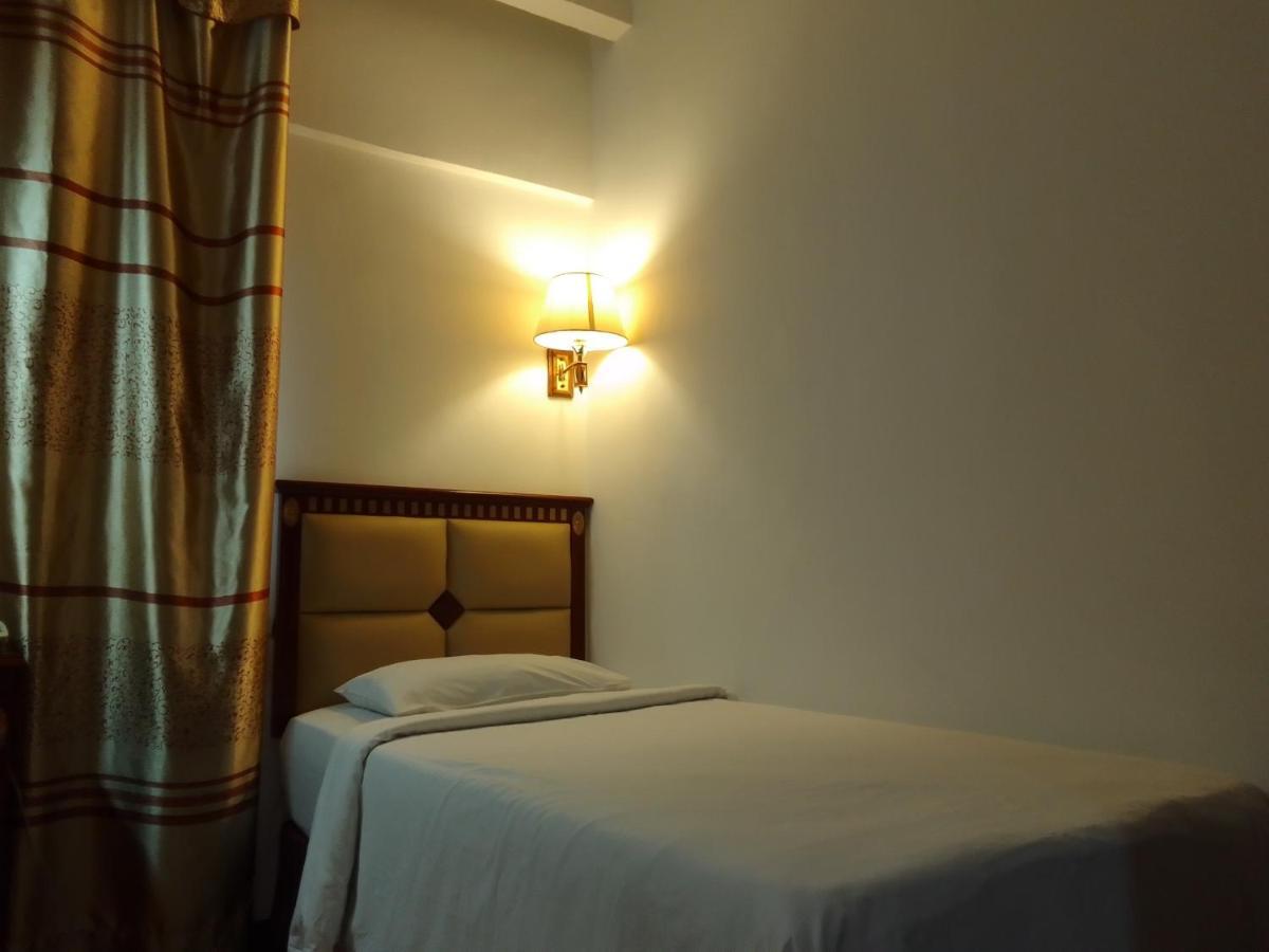 Super Oyo 90464 Borneo Suites Hotel Kota Kinabalu Exterior foto