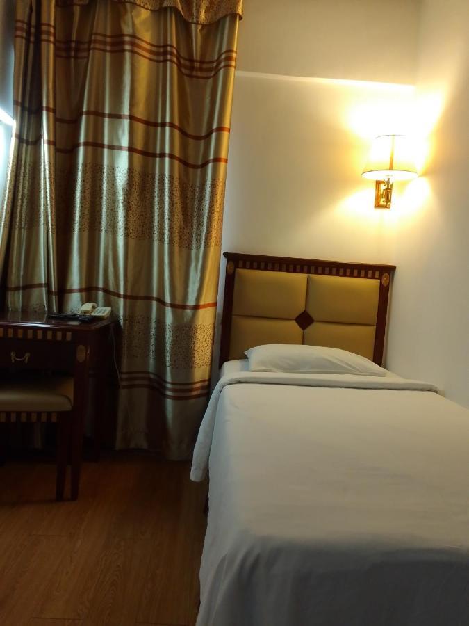 Super Oyo 90464 Borneo Suites Hotel Kota Kinabalu Exterior foto